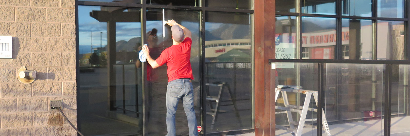 Washing storefront windows